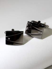 1 par de abotoaduras masculinas com decoração de strass em formato de arma