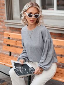 Sudadera unicolor de hombros caídos