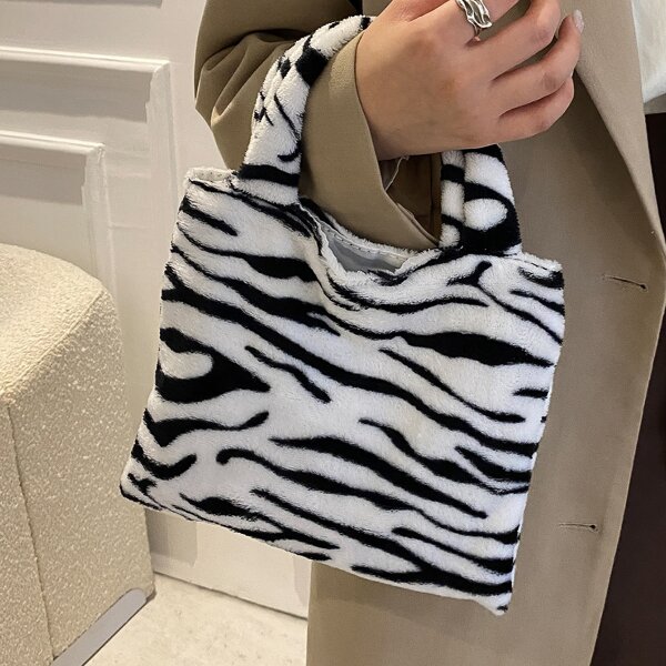 

Zebra Striped Pattern Fluffy Satchel Bag, Black and white