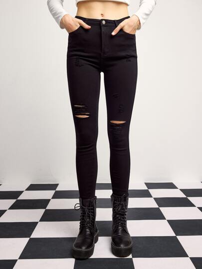 بنطلون نسائي طويل بقصة ضيقة وتمزقات، موحد اللون وكاجوال