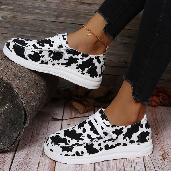 

Cow Pattern Lace Up Design Flats, Black and white