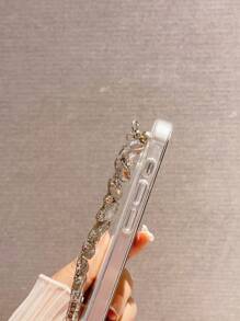 Telefoonhoesje met lovertjes en armband met strass