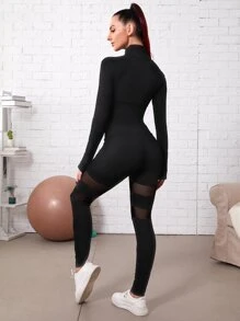 素色插肩袖半開襟拉鏈上衣和網紗拼接緊身打底褲