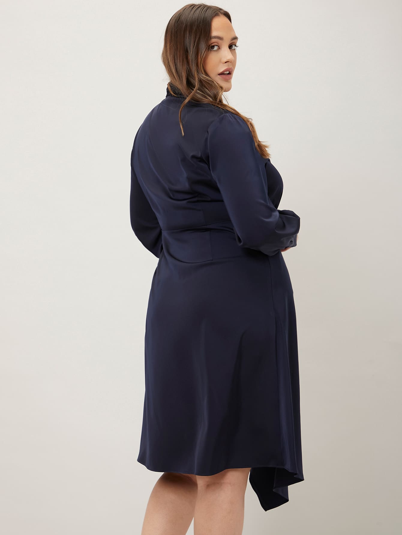 PLUS TIE NECK ASYMMETRICAL HEM DRESS