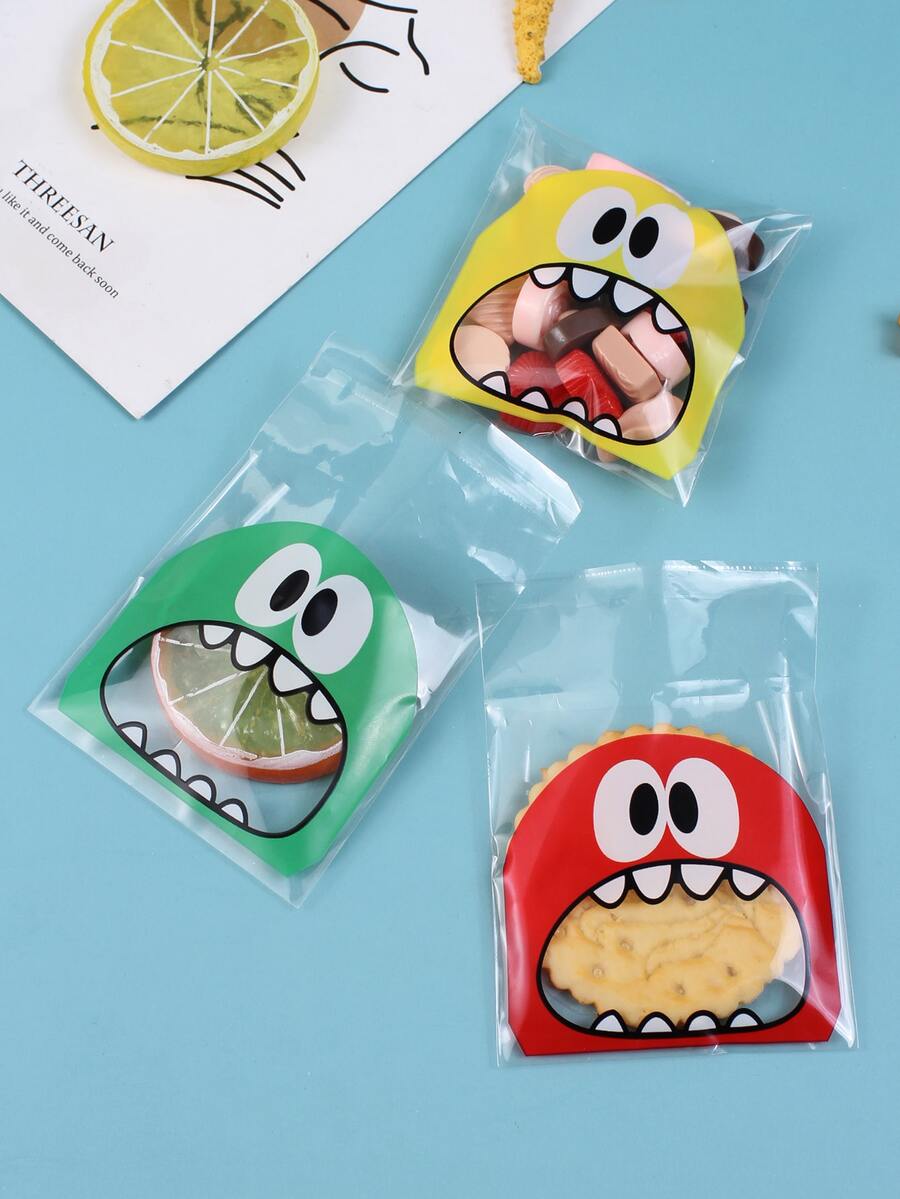 100pcs Disposable Candy Storage Bag, Cartoon Graphic Random Color