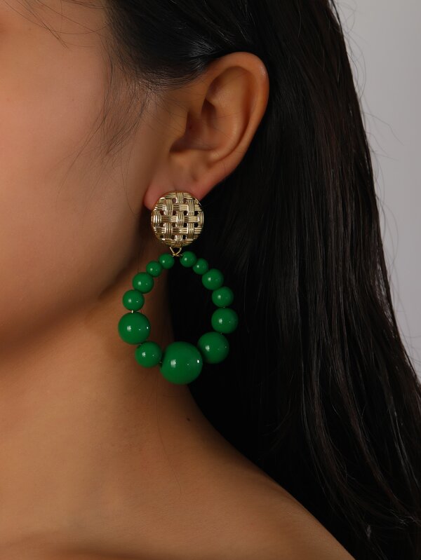 Pendientes largos con diseño de cuenta circular