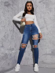 Jeans ajustados de talle alto roto con abertura - Azul lavado medio - Ver 4