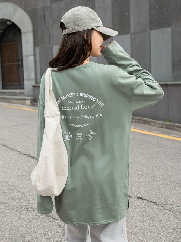 DAZY Camiseta de manga larga con gráfico de eslogan, hombros caídos y bajo dividido para mujer, ropa de mujer de otoño