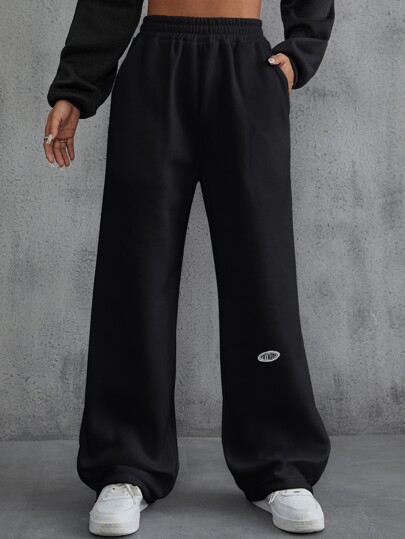 بناطيل رياضي تفاصيل مرقع بعبارة جيب مائل