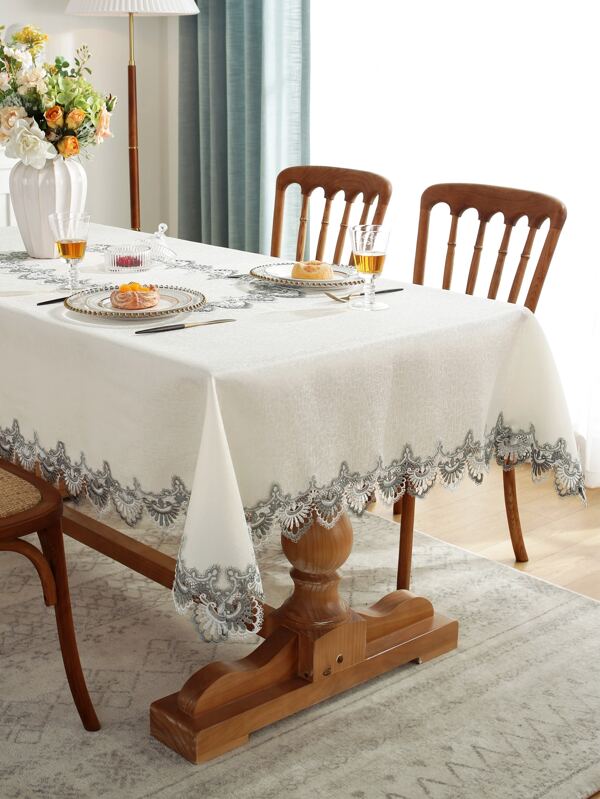 Mantel con patrón jacquard con encaje con diseño