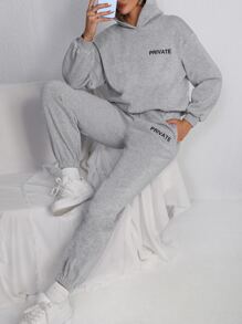 SHEIN Unity Pantalones deportivos con capucha con estampado de letra de hombros caídos - Gris Claro - Ver 1