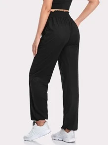 Pantalones de chándal de unicolor con bolsillo, dobladillo de volantes y cordón - Negro - Ver 2