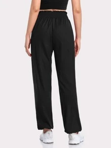 Pantalones de chándal de unicolor con bolsillo, dobladillo de volantes y cordón - Negro - Ver 4