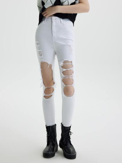 جينز نسائي الزر مثقوب الجيب سستة الصاف