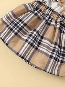 Đầm em bé Nơ Bướm Xù Sọc ca rô Sẵn sàng - Nhiều màu - Xem 6