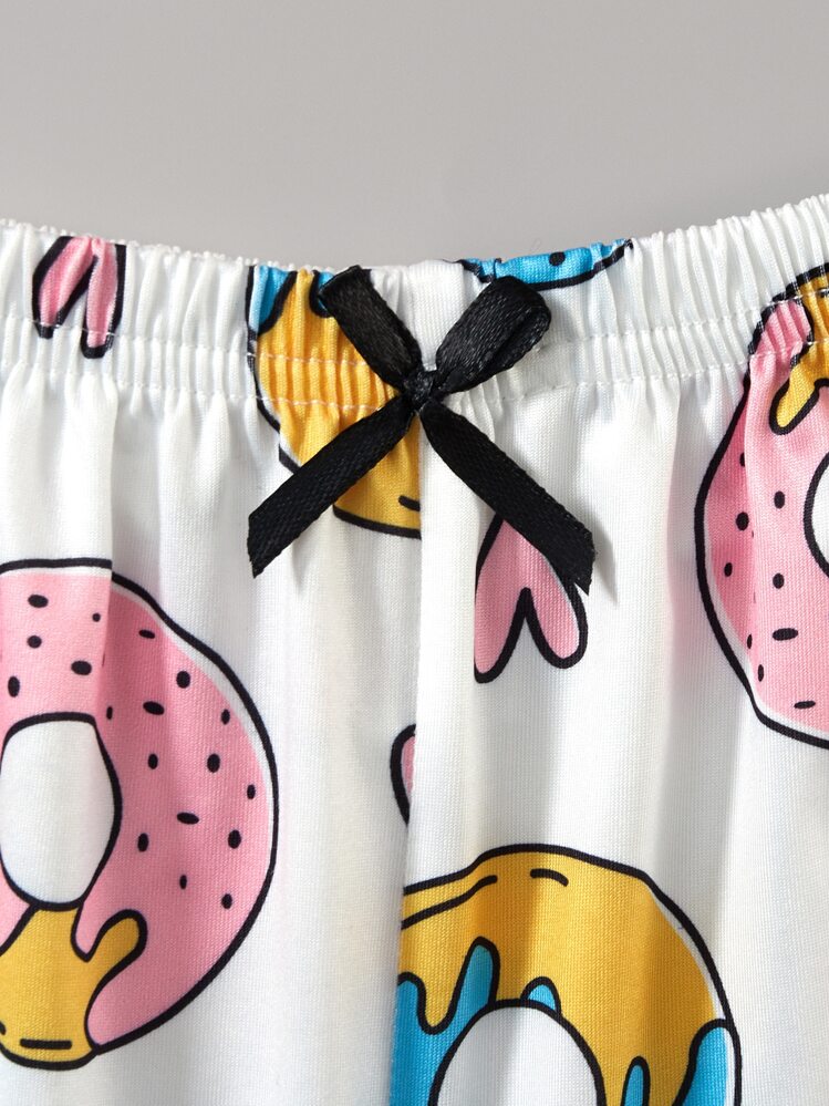 SHEIN Conjunto de pijama / camiseta y pantalón con estampado de donas y con adorno de volantes - Rosa Pálido - Añade 4