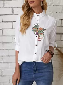 Bluse mit Figur Stickereien und gerollten Ärmeln