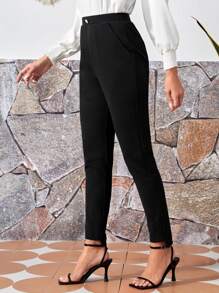 EMERY ROSE Pantalones sastre con bolsillos en ángulo y bajo asimétrico para otoño/invierno