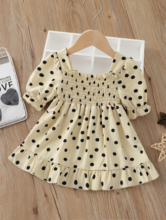 فستان بنقاط بولكا بصدر مدرز للبنات الرضع