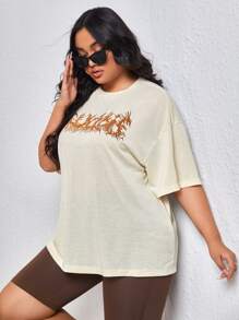 Flirla プラス グラフィックプリント ドロップショルダーTシャツ
