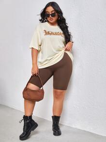 Flirla プラス グラフィックプリント ドロップショルダーTシャツ