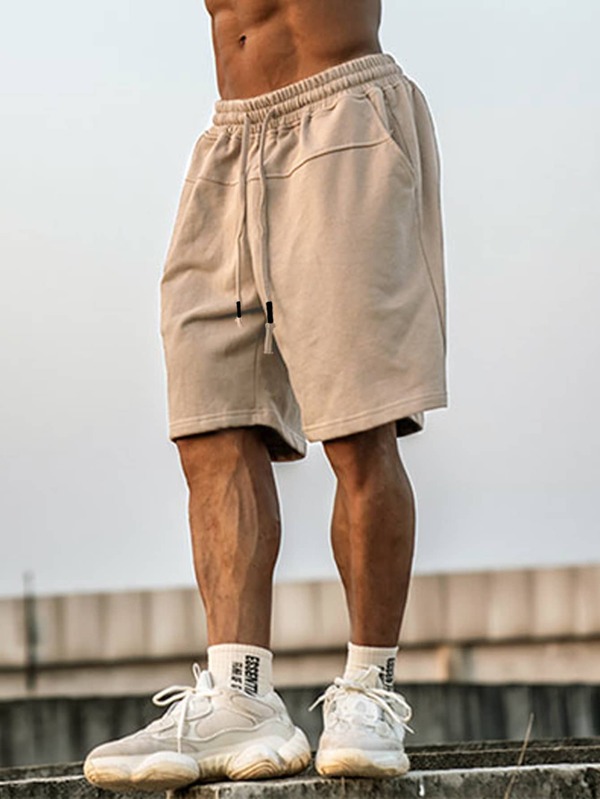 Manfinity Hypemode Pantaloni corti larghi a gamba larga con coulisse per uomo di colore kaki, fino al ginocchio