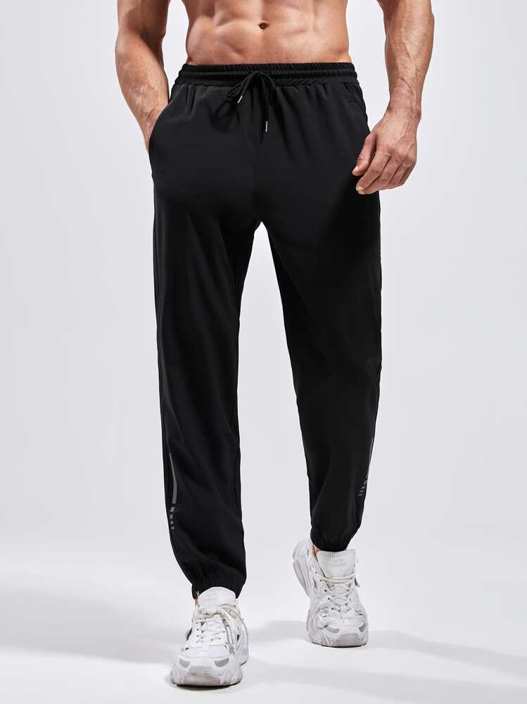Manfinity Fitness Pantalones deportivos de estilo novio con cordón en la cintura - Negro - Añade 5