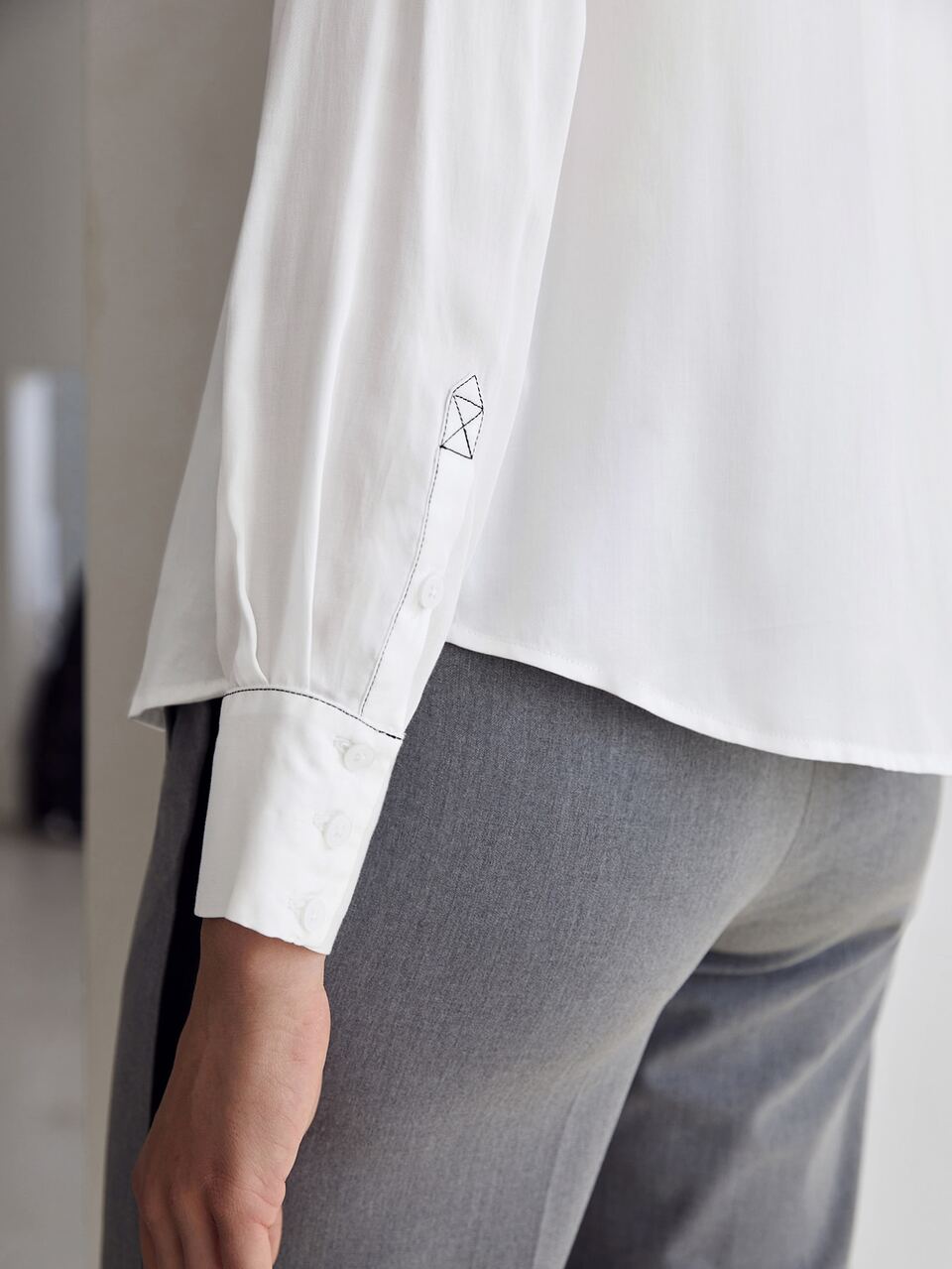 CONTRAST STITCH DRAPED BLOUSE