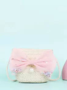 女孩蝴蝶結裝飾草編包