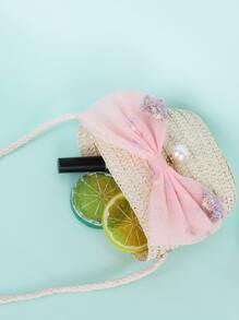 女孩蝴蝶結裝飾草編包