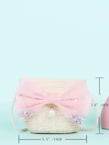 女孩蝴蝶結裝飾草編包