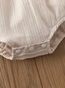 嬰兒蕾絲細節木耳邊領燈籠袖連身背心