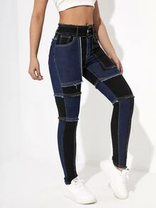 Jeans ajustados de color combinado desgarro bajo crudo