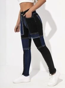 Jeans ajustados de color combinado desgarro bajo crudo