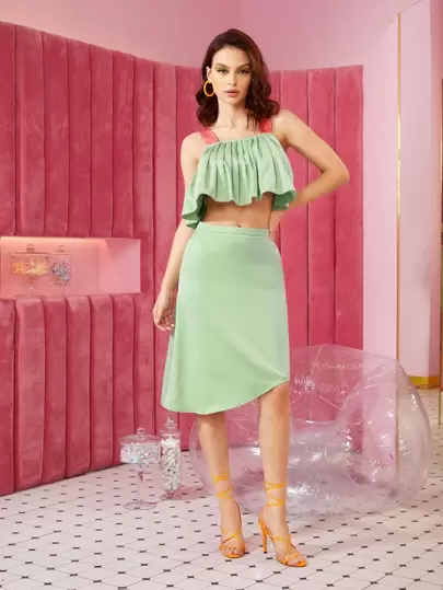 Martha Yupangco con fruncido Top tank & bajo asimétrico Falda