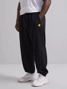 EASEVO Men Cartoon Face Patch Detail Tapered Joggers - Black - View 1