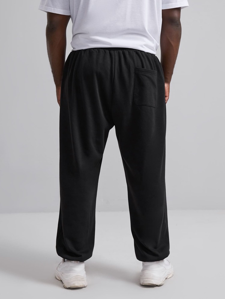 EASEVO Hombres Pantalones deportivos cara de dibujos animados con diseño de parche cónico - Negro - Añade 2