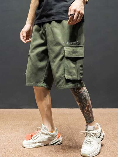 Manfinity Homme Men Letter Graphic Flap Pocket Drawstring Cargo Shorts