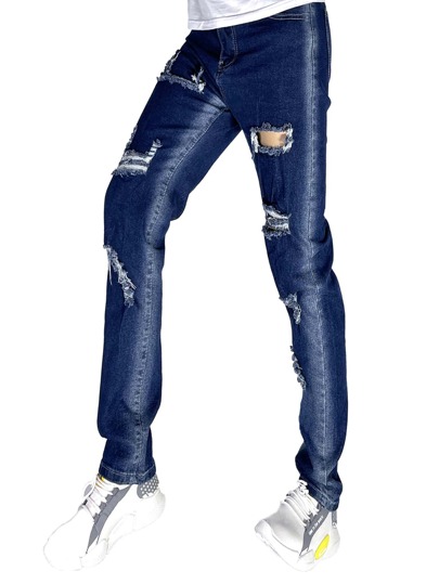 Hombres Jeans desgarro con lavado