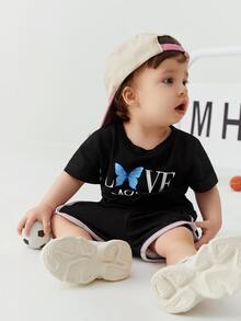 Tops em bé Lá thư Loại bướm - màu đen - Xem 1