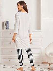 SHEIN Unity Figure Graphic Drop Shoulder High Low Hem Tee & Striped Leggings PJ Set - Black and White - View 2