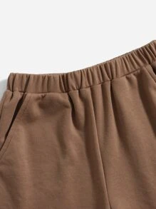 SHEIN 女孩字母圖案斜口袋短褲