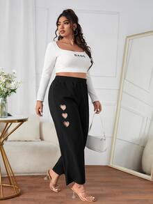 Pantalones de pierna ancha en forma de corazón con abertura