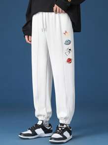 Manfinity Men Spaceman & Planet Print Seam Detail Drawstring Joggers - White - View 1