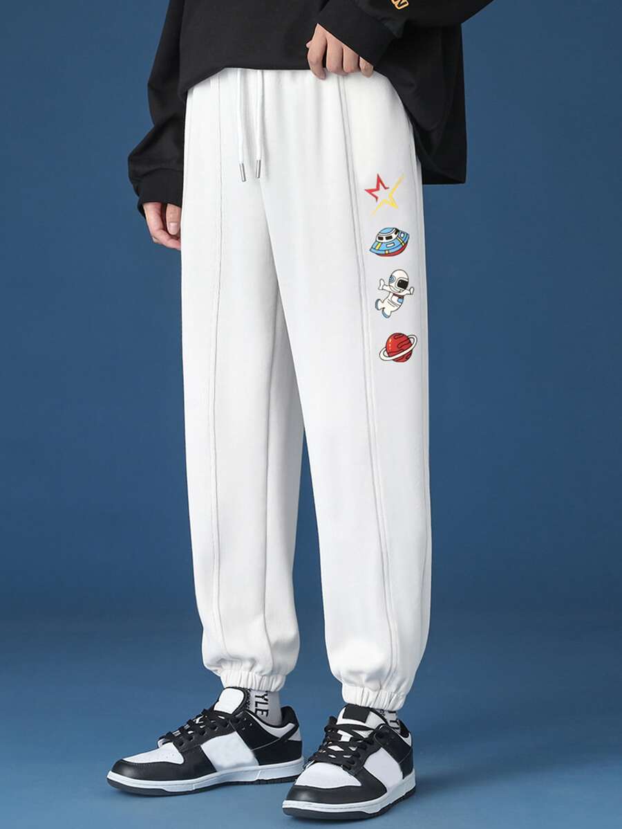 Manfinity Men Spaceman & Planet Print Seam Detail Drawstring Joggers - White - View 1