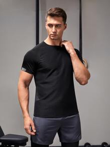 Manfinity Fitness Camiseta deportiva de manga raglán con detalle reflectante, estilo novio, para entrenamiento
