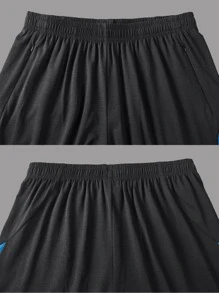 Quần short thể thao phối màu cạp chun phong cách bạn trai cho nam - màu đen - Xem 5