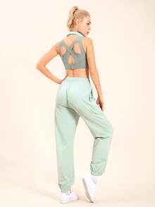 Áo lót thể thao Nữ Hội Chữ thập màu trơn - Màu xanh Bạc hà - Xem 3