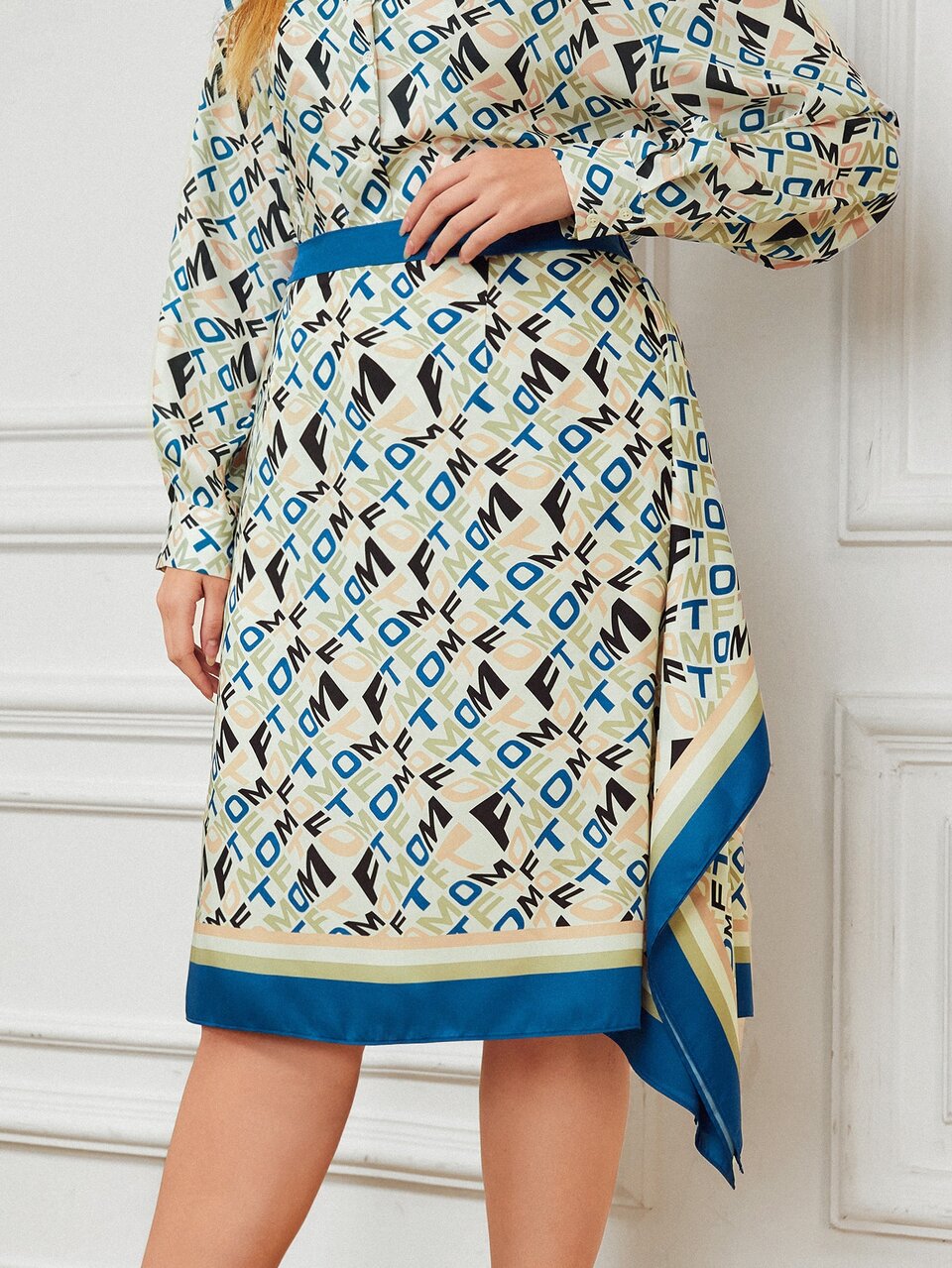 PLUS ASYMMETRICAL SKIRT