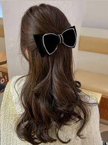 水鑽和蝴蝶結裝飾彈簧夾